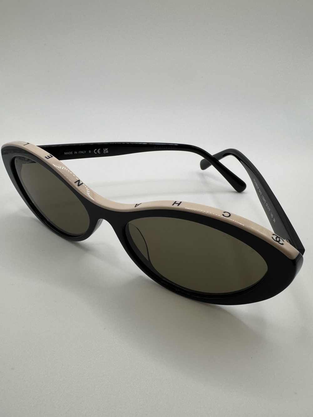 Black and Beige Oval Sunglasses with Logo Detail